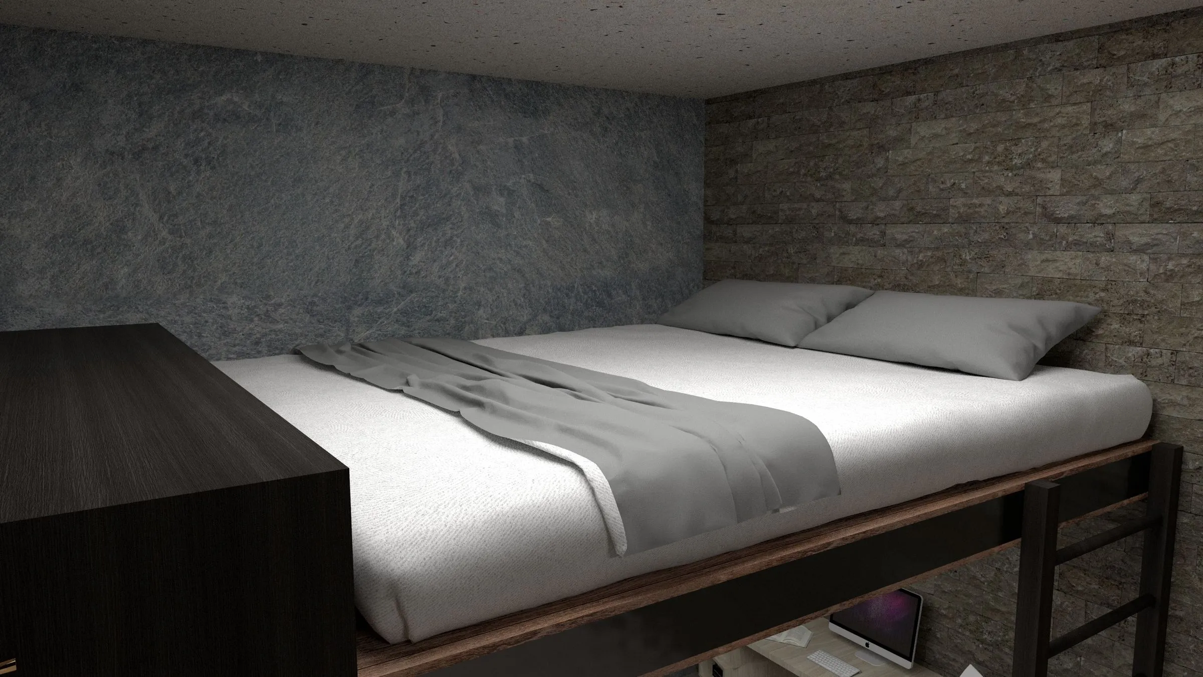 Bedroom at Kestrel House with a low bed against a textured stone accent wall.