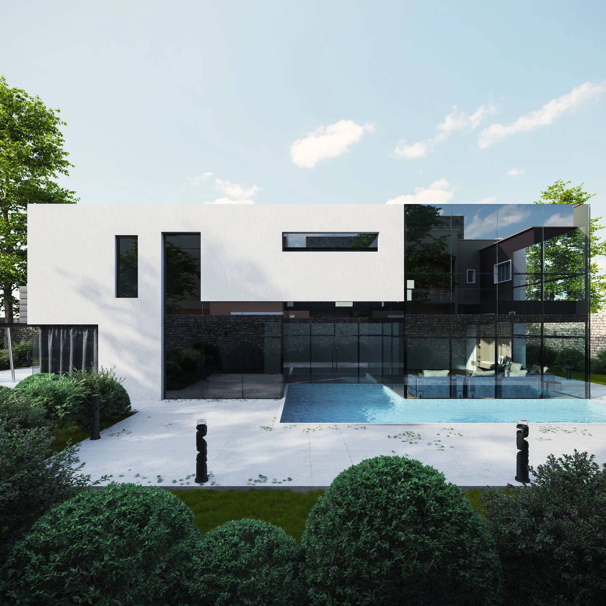 The Oak House seen from the garden — a low modern villa with a lap pool along its length.