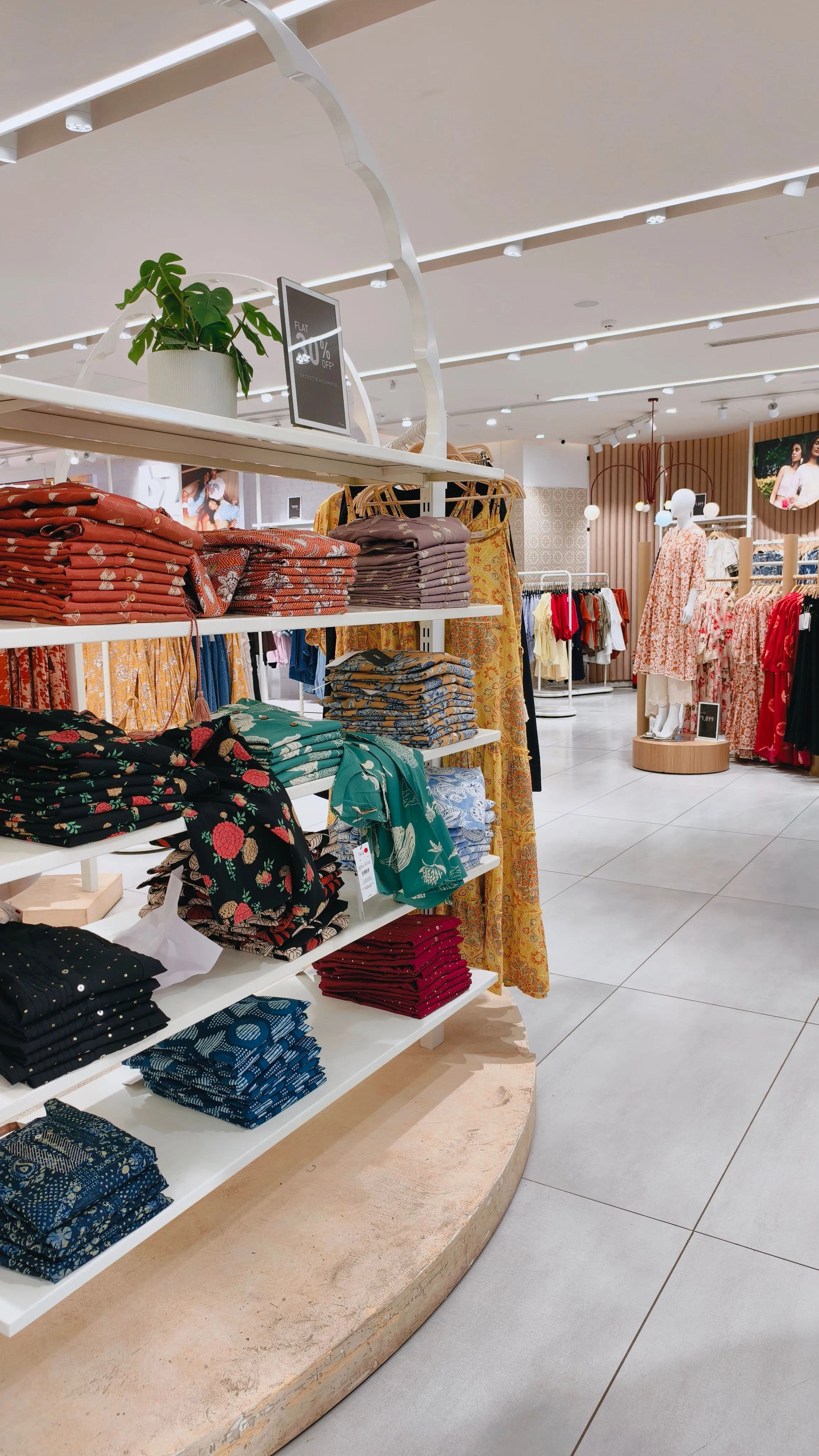 Wide view of the Vault & Vine sales floor with daylight from the shopfront.
