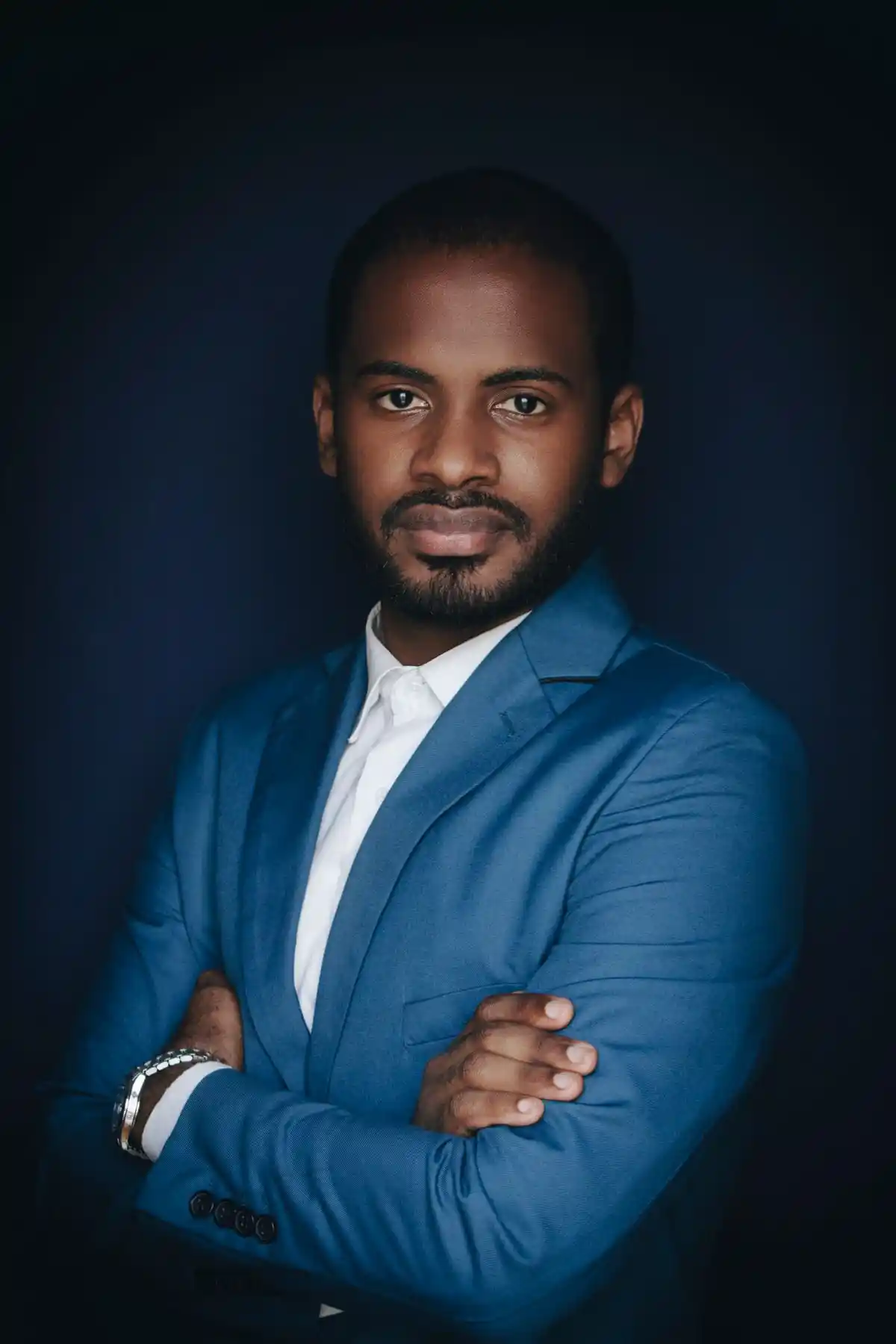 Studio portrait of a man in a blue suit
