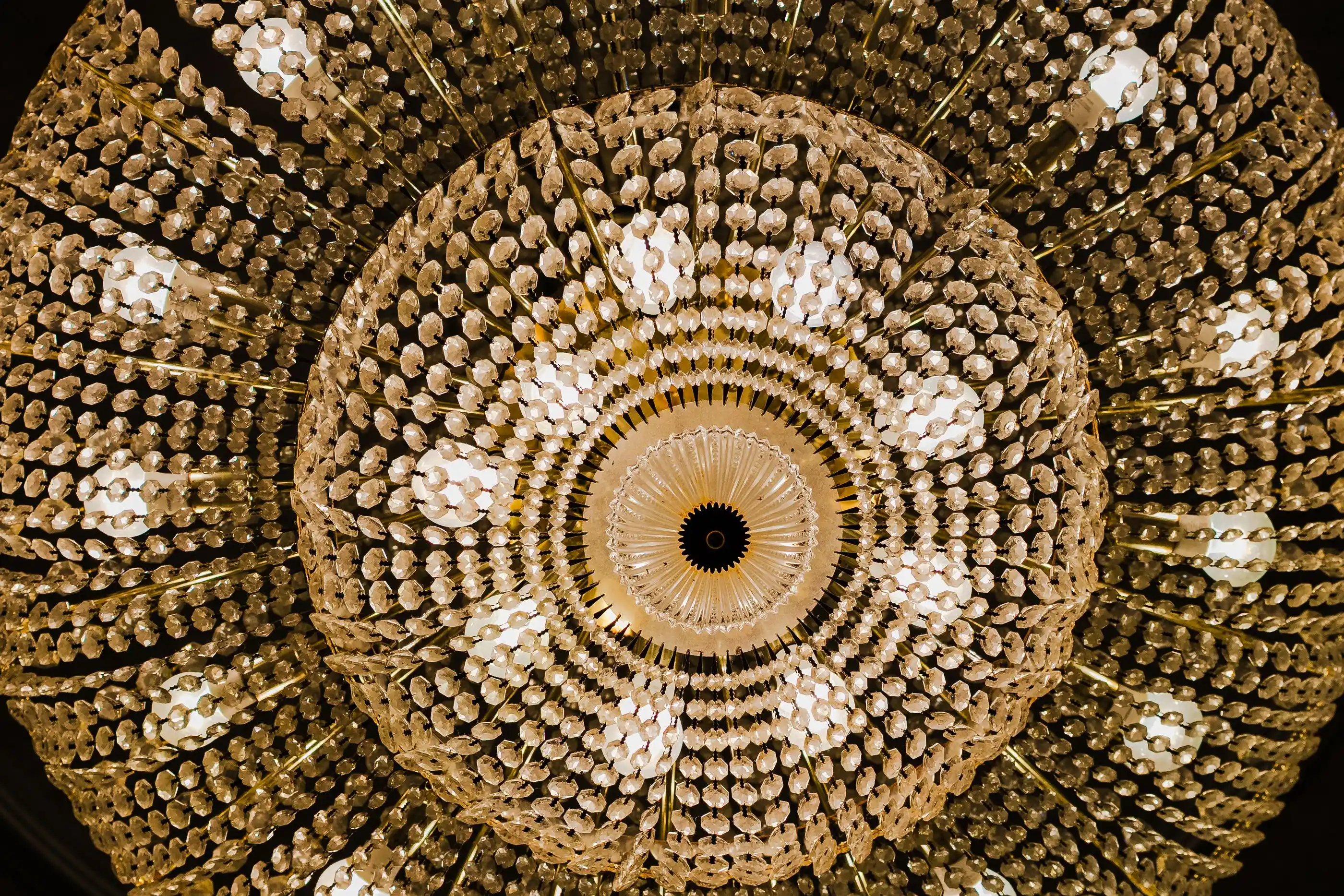 A crystal chandelier photographed from directly below