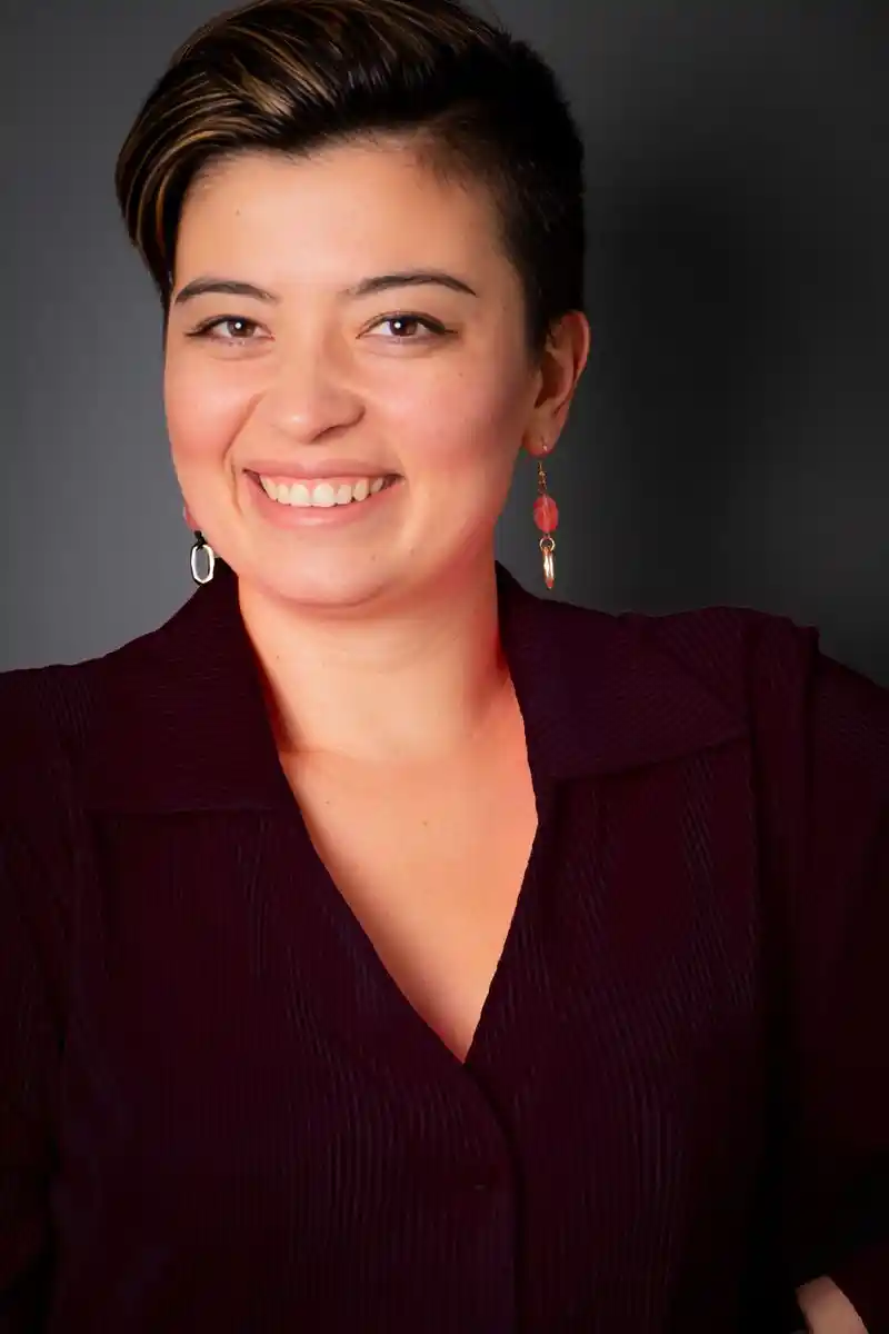 Portrait of a smiling woman in formal dress