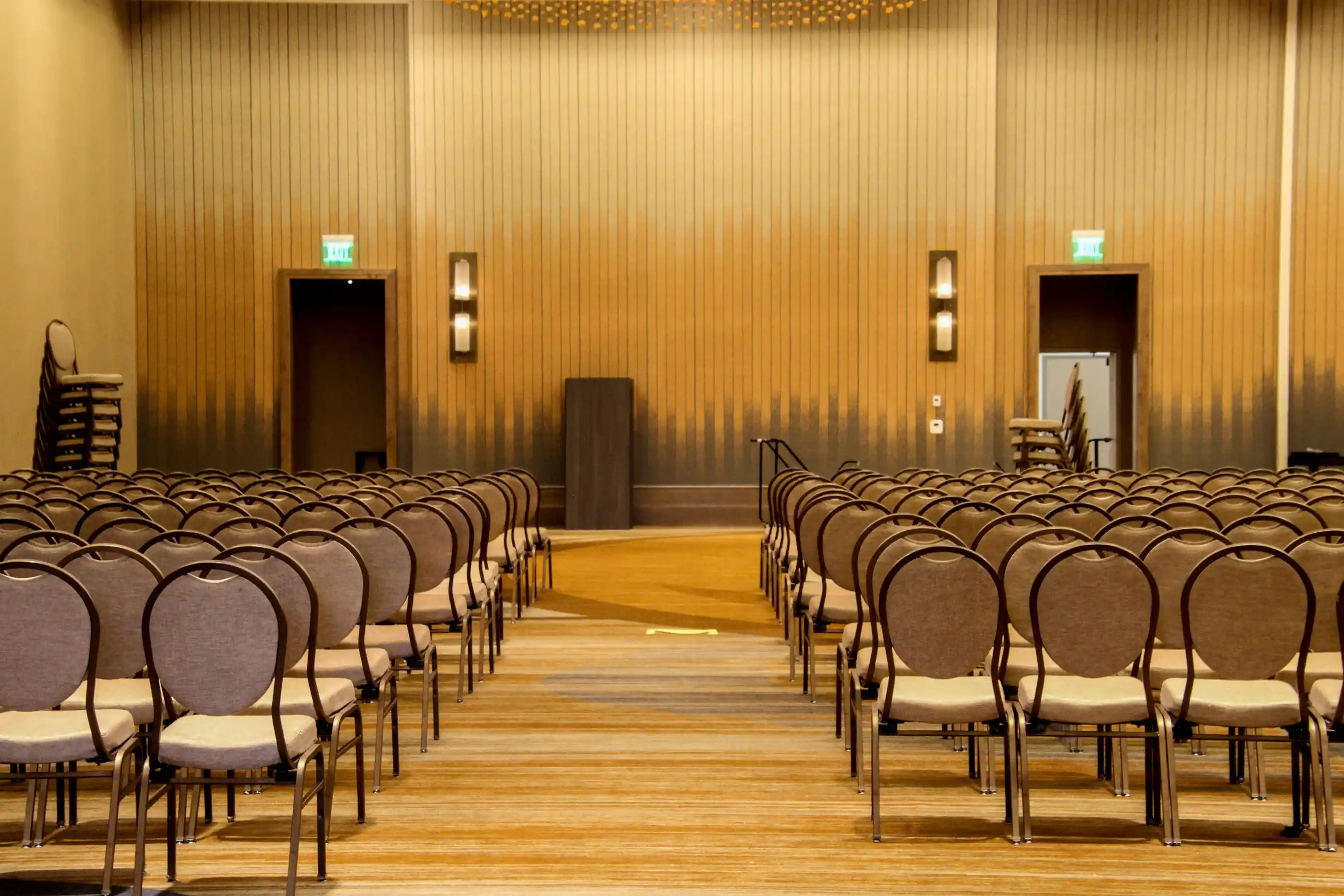 A large conference room with chairs set in rows