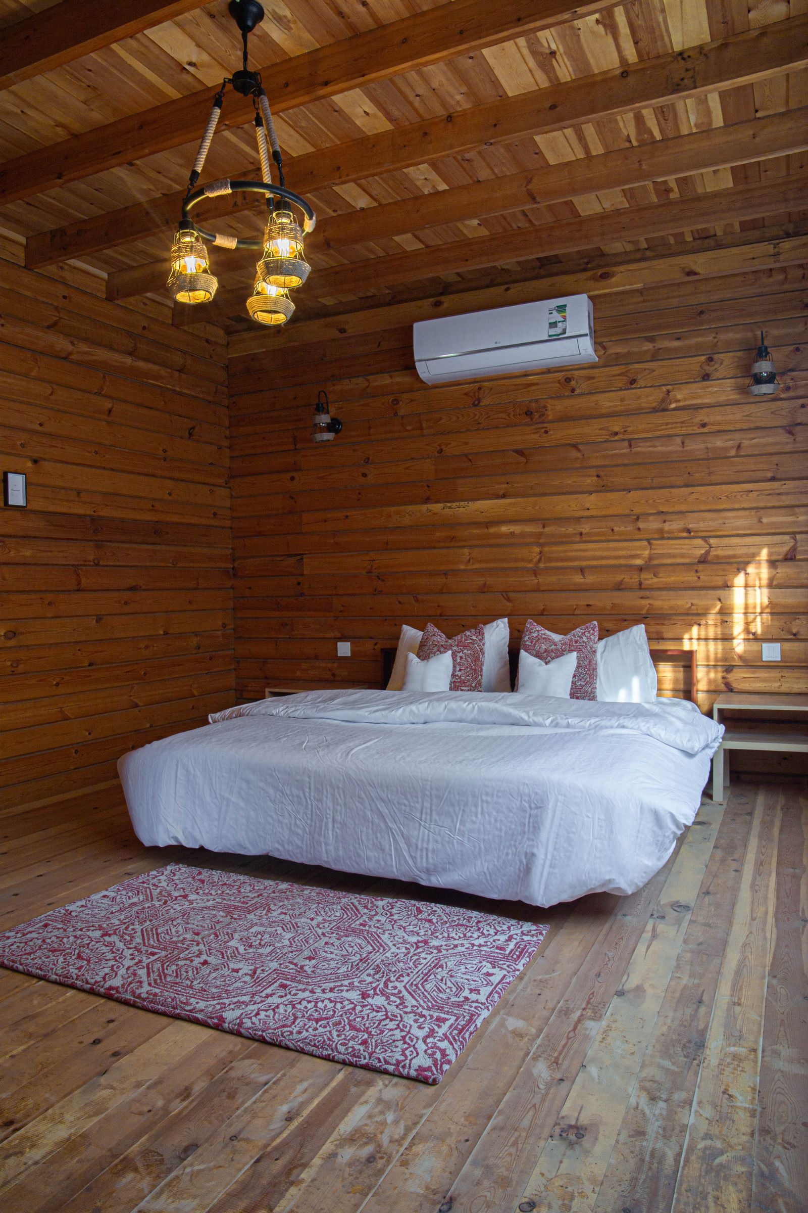 Interior render — panelled bedroom under the pitched roof