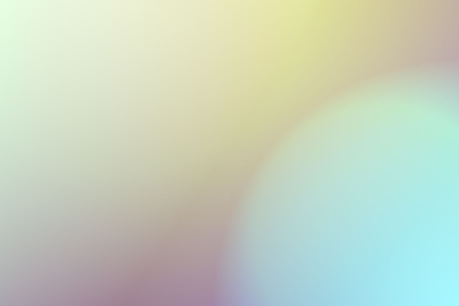 A soft pastel gradient shading from cream into pale blue