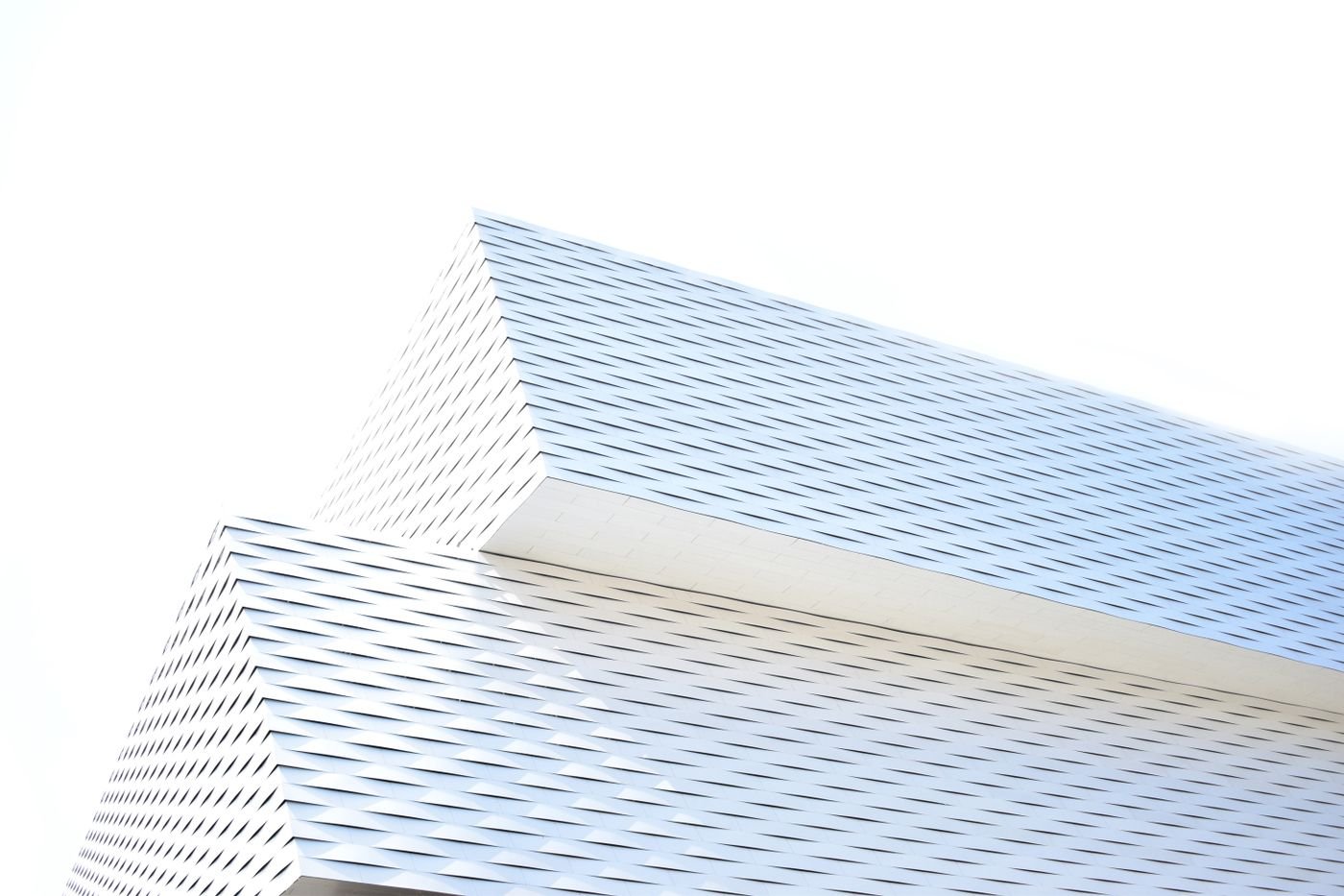 A crisp white architectural form seen from below