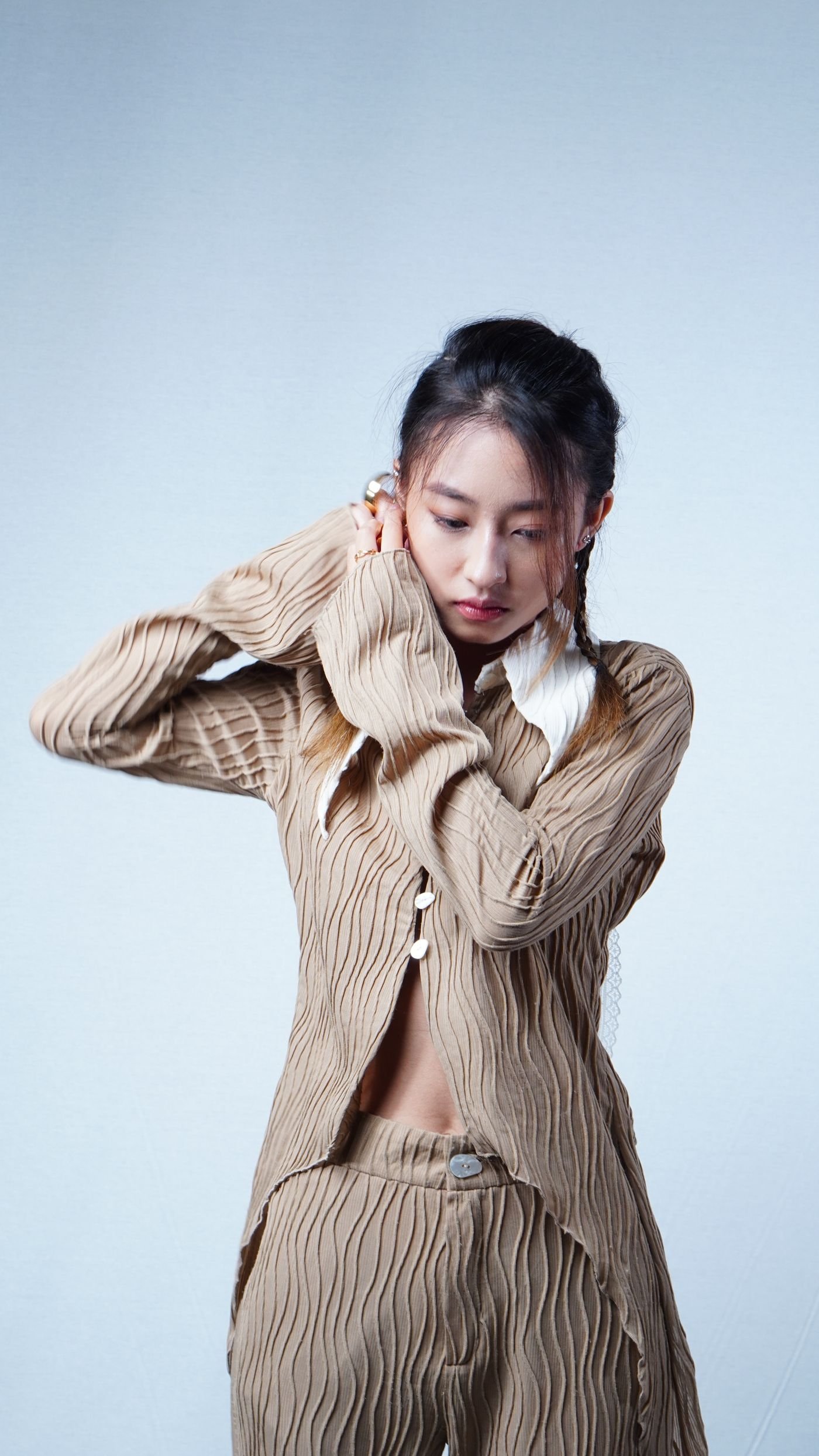 Editorial portrait in soft neutral tones