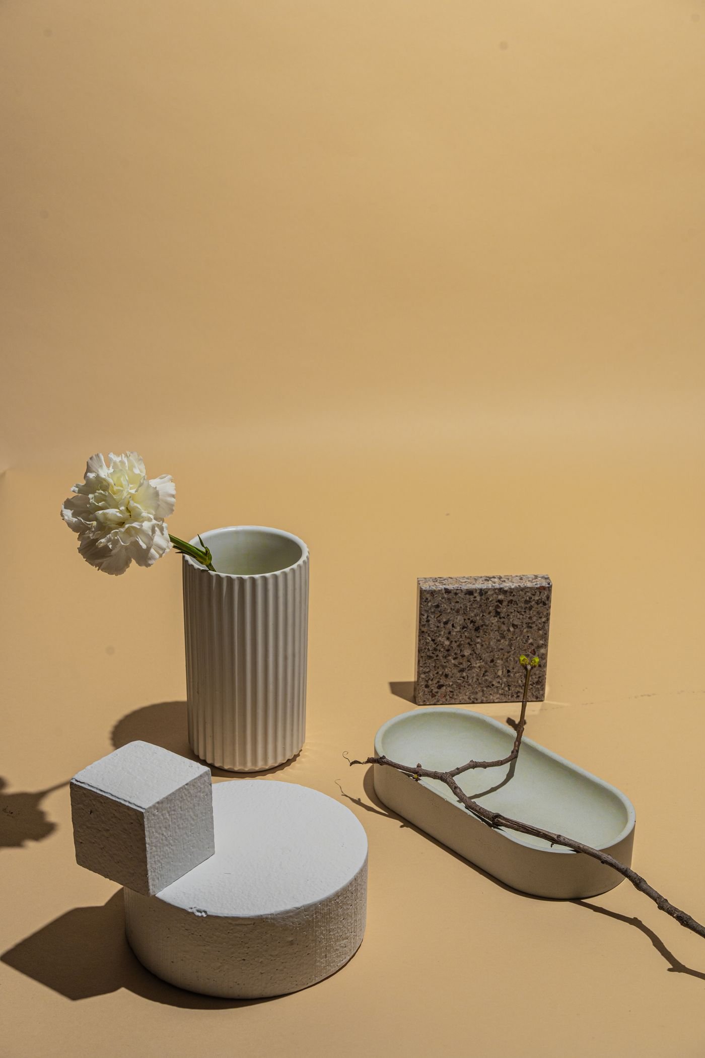 Small geometric objects arranged in raking light