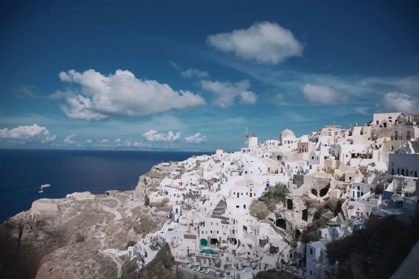 Whitewashed Cycladic houses above the Aegean