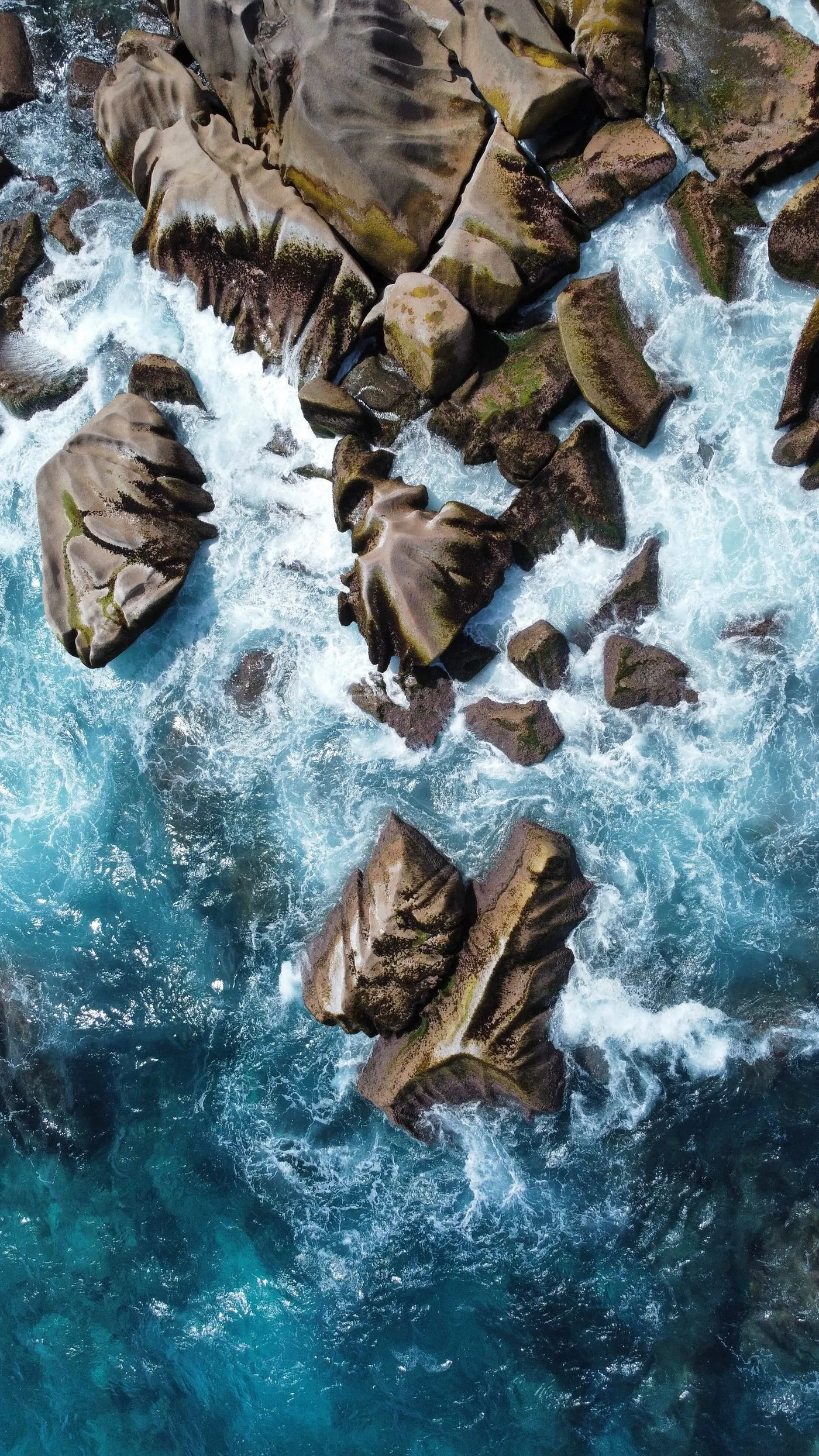 Rock formations in turquoise water