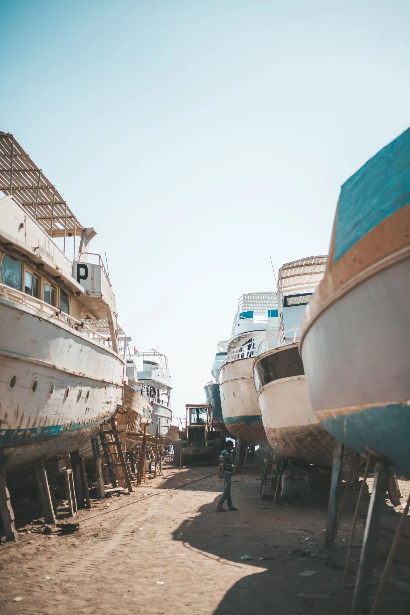 Boats hauled out for maintenance at a working yard