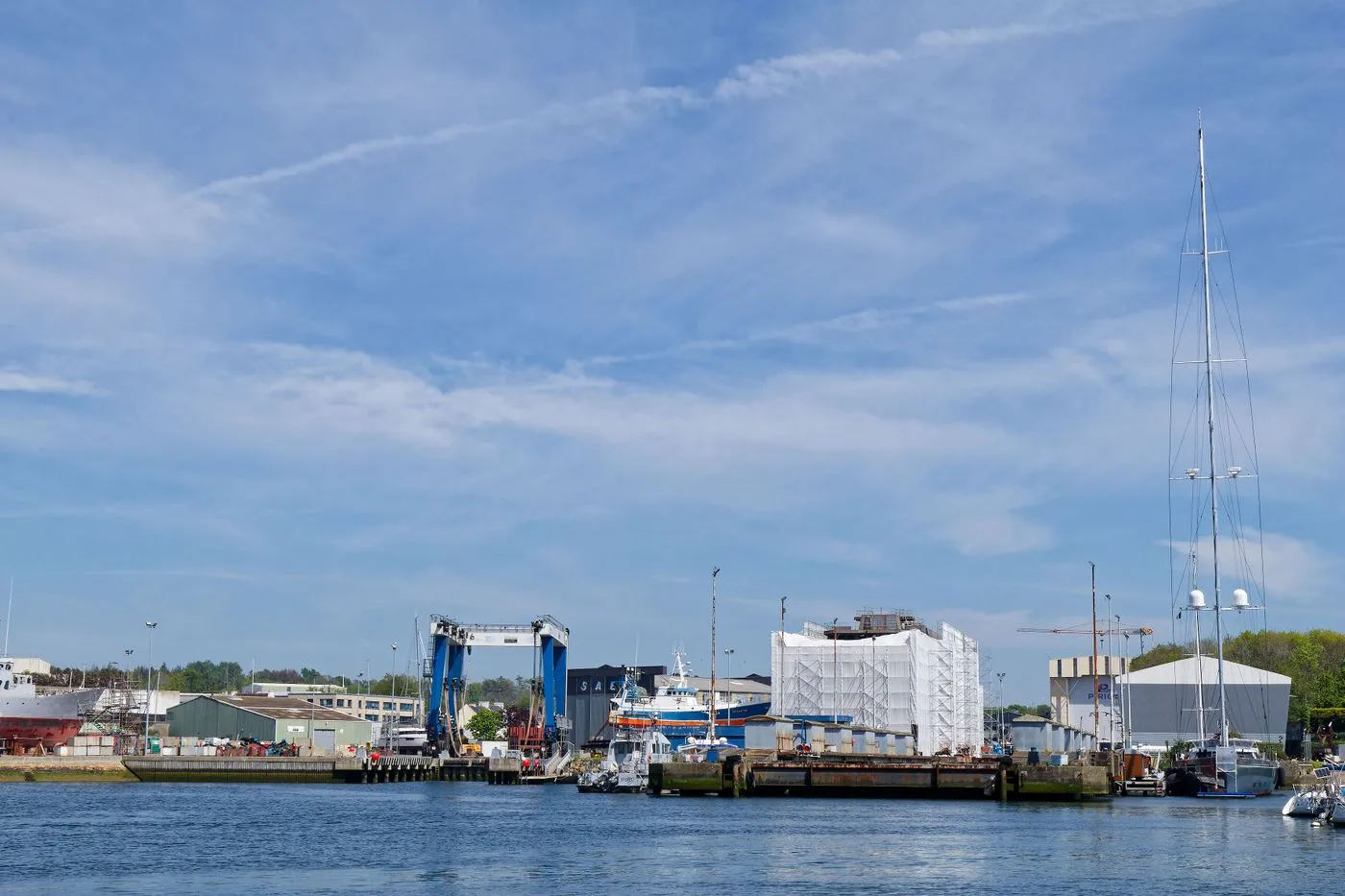A working harbour front with moored vessels
