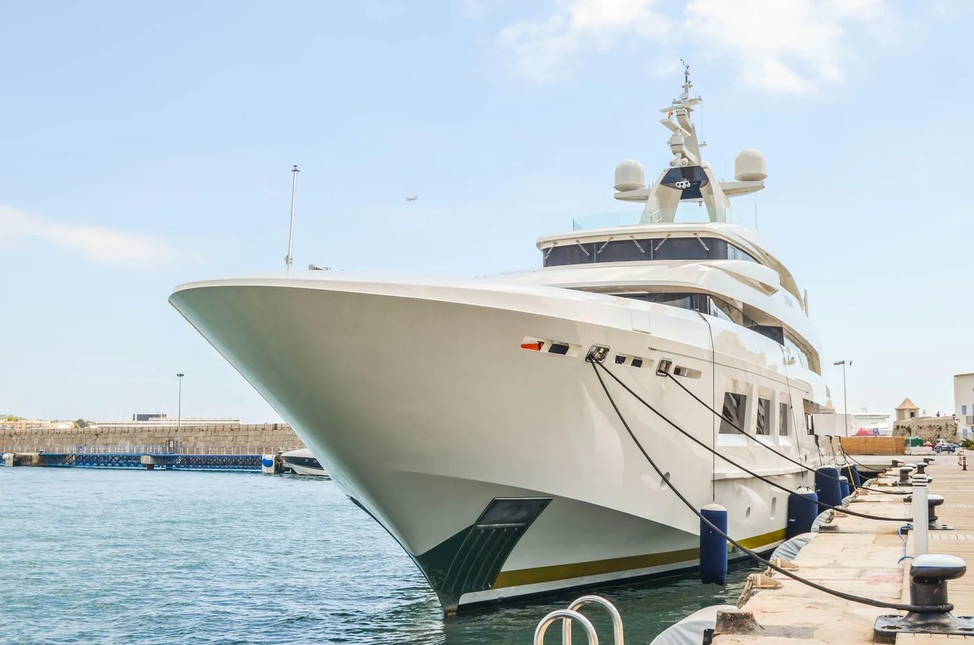 Sleek motor yacht berthed in warm evening light