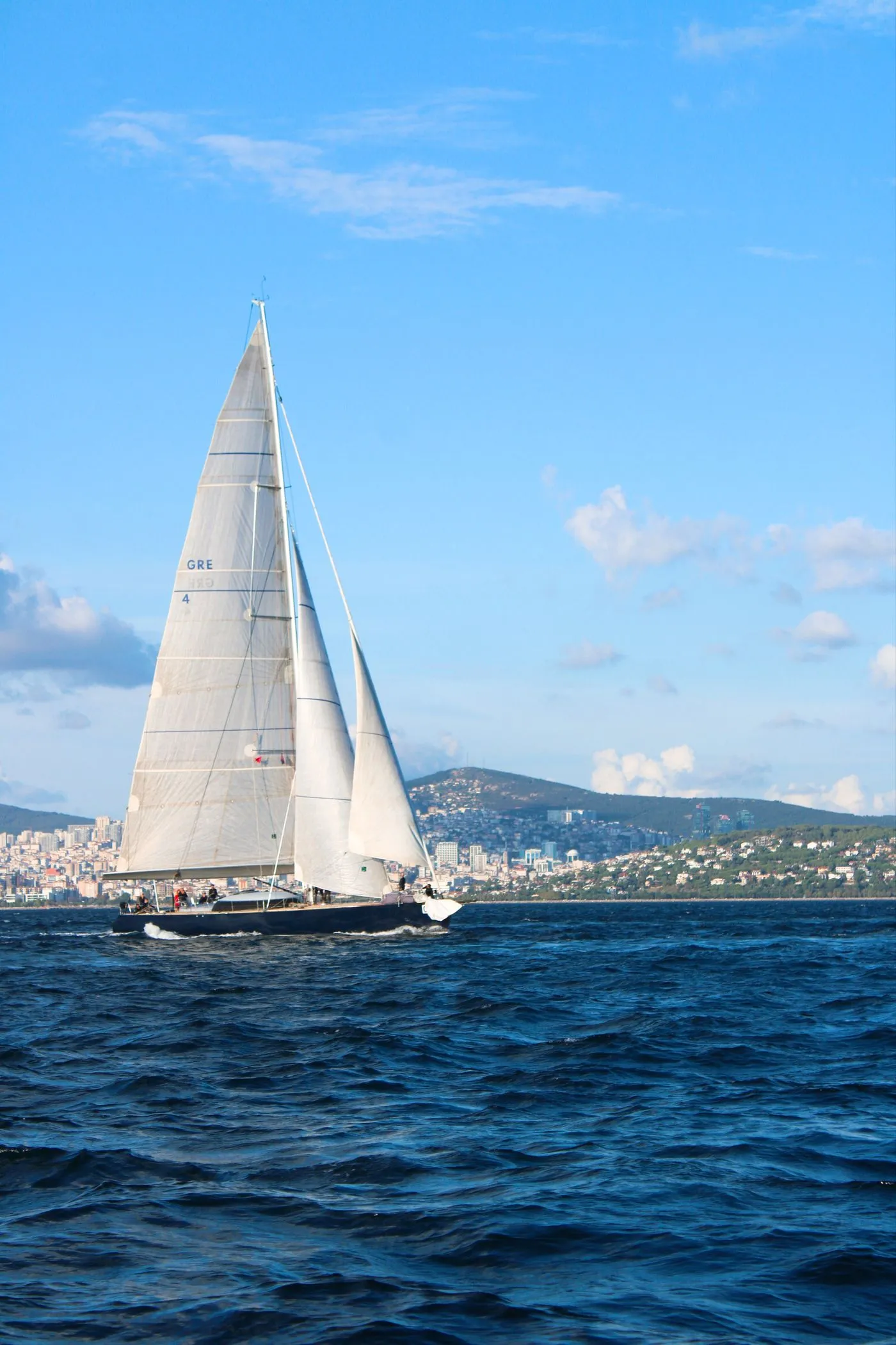 Sailing yacht heeling on open ocean