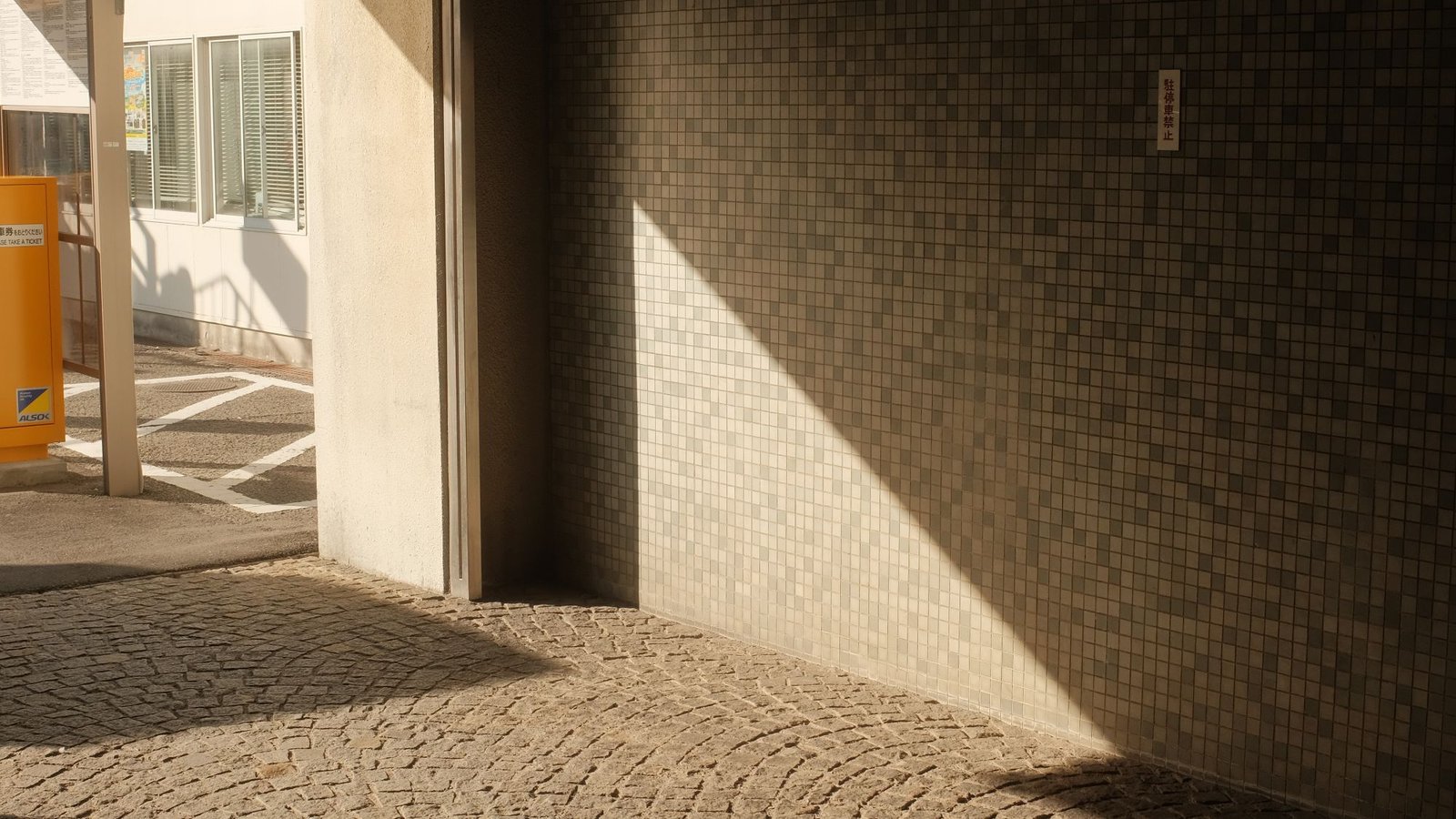 Dark passage opening onto bright daylight