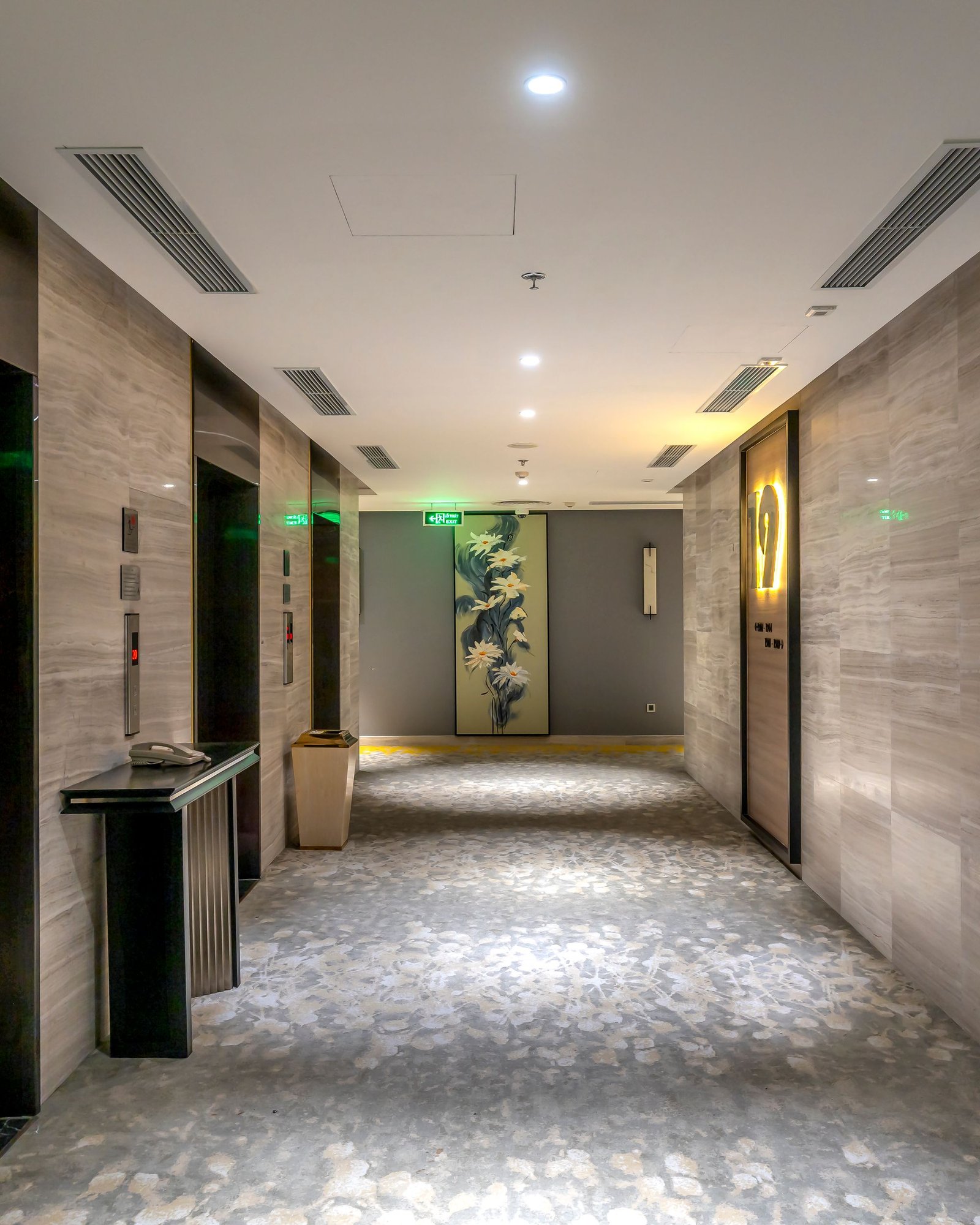 Stone-lined corridor with soft daylight from both ends