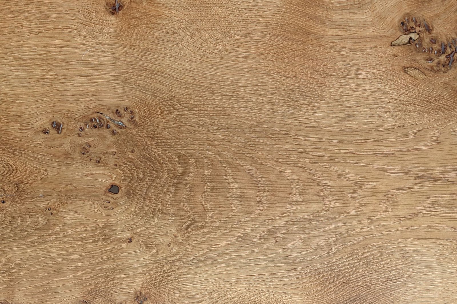 Close-up of oak grain showing knots and figure in the timber