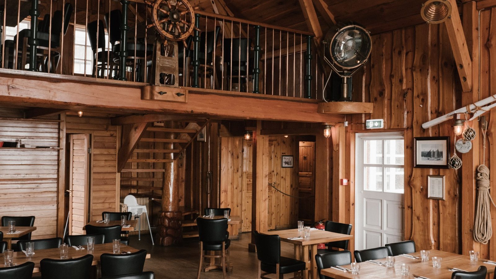 Dining room under an exposed timber roof structure
