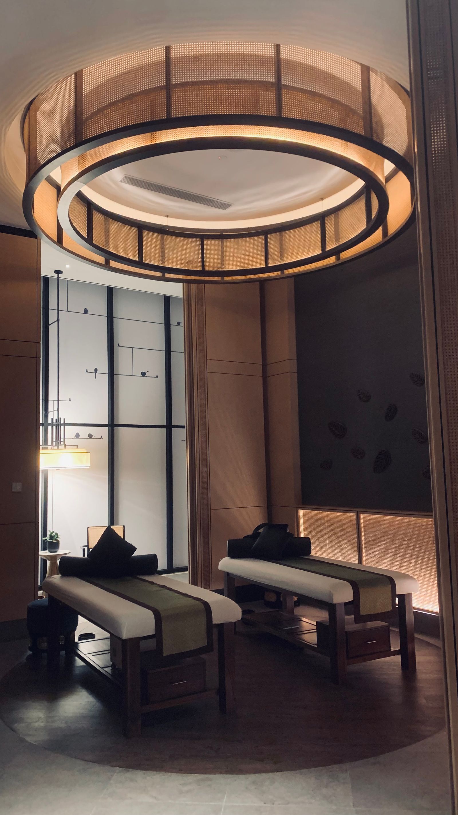 An elegant spa treatment room with ambient lighting